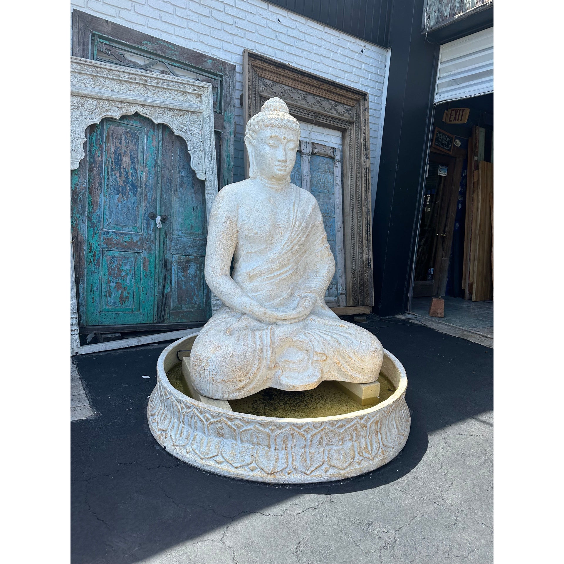 White Buddha Fountain The Broward Design Center
