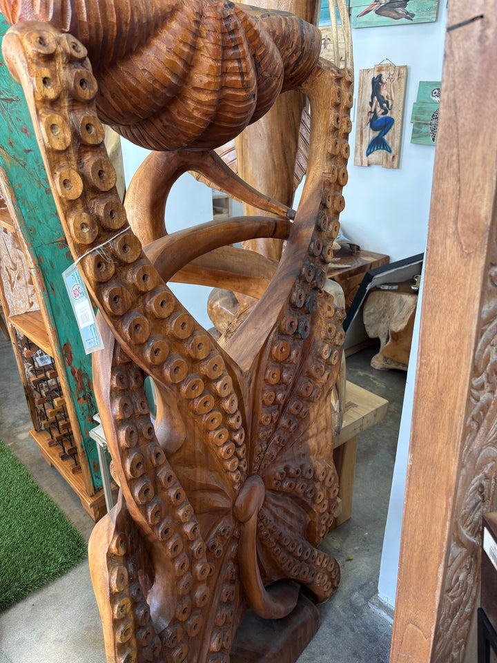 Suar Octopus Sculpture Holding Shell Broward Design Center