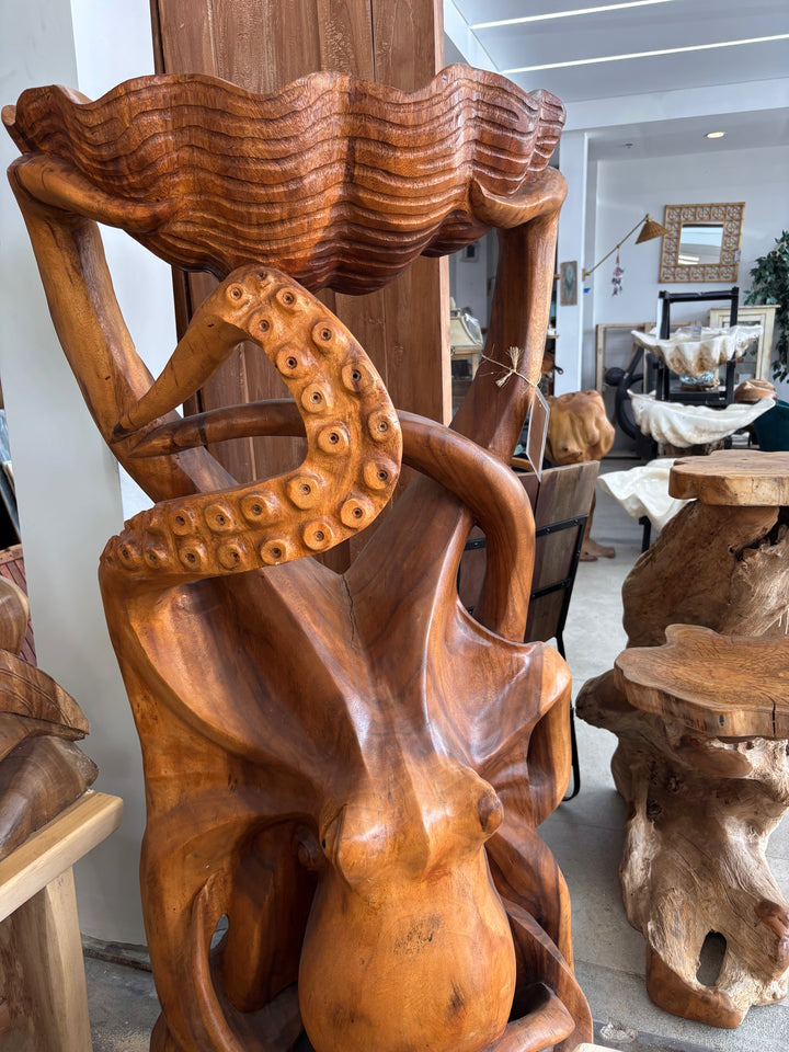 Suar Octopus Sculpture Holding Shell Broward Design Center
