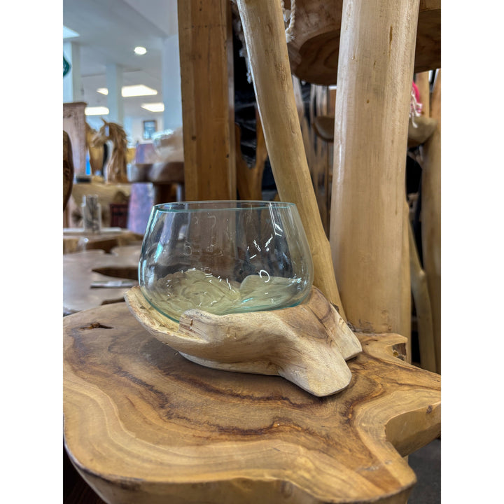 Wood hands with blown glass Broward Design Center